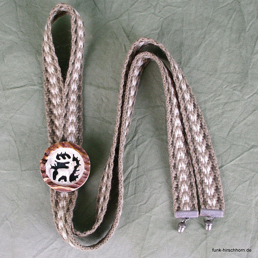 Trachtenband, Hirschhornknopf mit geschnitztem Hirsch